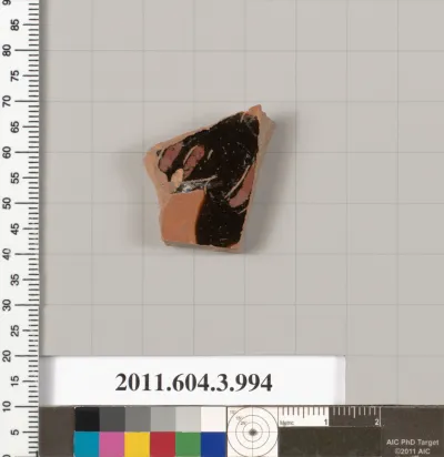 Terracotta fragment of a lekanis lid (covered dish)