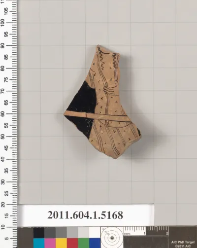 Terracotta fragment of a kylix (drinking cup)