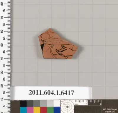 Terracotta fragment of a kylix (drinking cup)