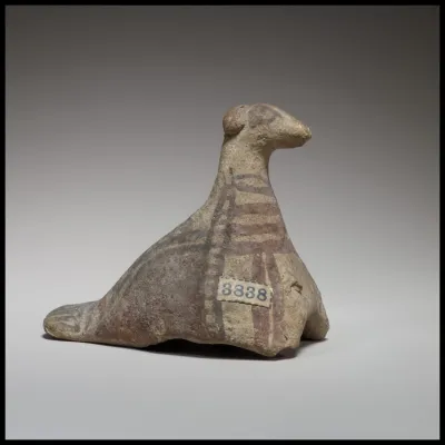 Seated bird figurine