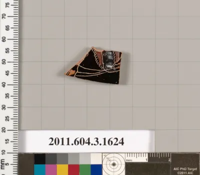 Terracotta fragment of a kylix: Band cup (drinking cup)