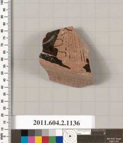 Terracotta fragment of a lekanis lid (covered dish)