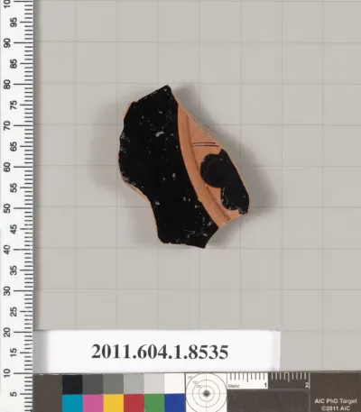 Terracotta fragment of a stemless kylix (drinking cup)