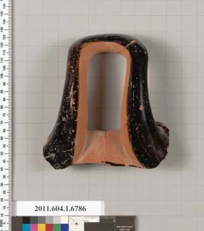 Terracotta fragment of a kylix (drinking cup)