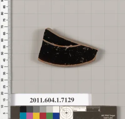 Terracotta fragment of a kylix (drinking cup)