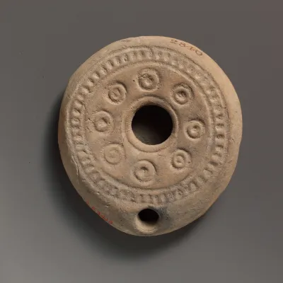 Terracotta oil lamp