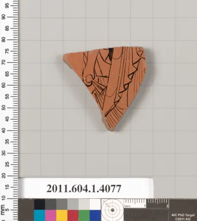 Terracotta fragment of a kylix (drinking cup)