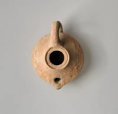 Terracotta oil lamp