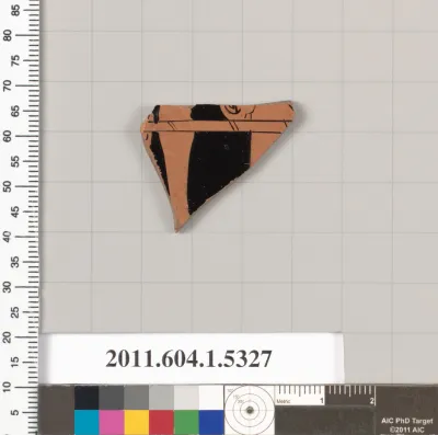 Terracotta fragment of a kylix (drinking cup)