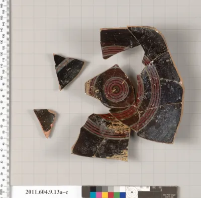 Terracotta fragments of a stemless cup (drinking cup) or a lid