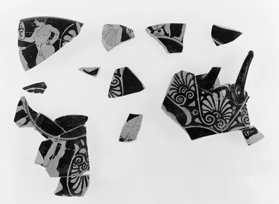 Attic Black-Figure Cup Fragment (part of 85.AE.473, comprised of 2 Joined Fragments)
