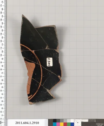 Terracotta fragment of a kylix (drinking cup)