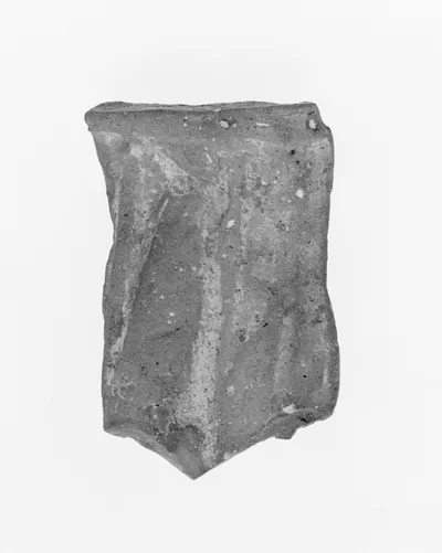 Figurine Fragment: Leg and Drapery