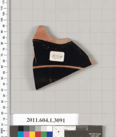 Terracotta fragment of a kylix (drinking cup)