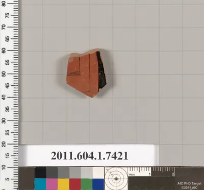 Terracotta fragment of a kylix (drinking cup)