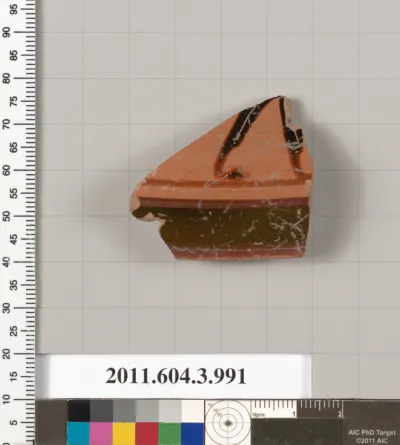 Terracotta fragment of a lekanis lid (covered dish)