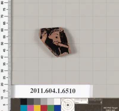 Terracotta fragment of a kylix (drinking cup)