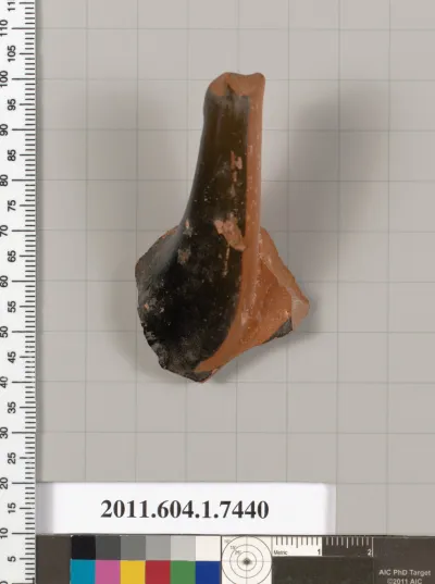 Terracotta fragment of a kylix (drinking cup)