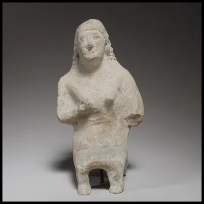 Seated female figurine