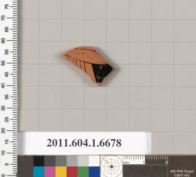 Terracotta fragment of a kylix (drinking cup)