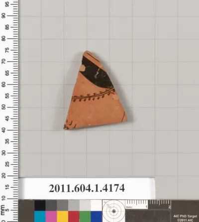 Terracotta fragment of a kylix (drinking cup)