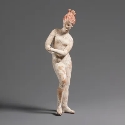 Terracotta statuette of a nude woman