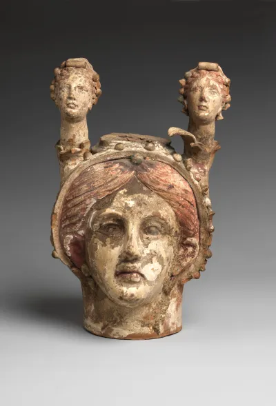 Polychrome terracotta head vase