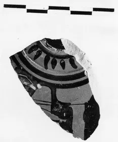 PYXIS LID, FRAGMENT (ATHENIAN, RED-FIGURE)