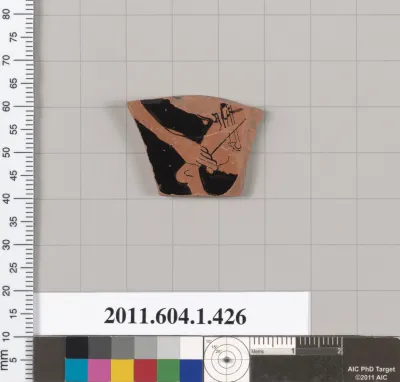 Terracotta fragment of a kylix (drinking cup)