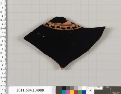 Terracotta fragment of a kylix (drinking cup)