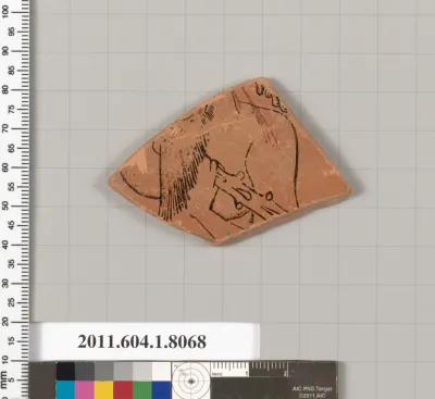 Terracotta fragment of a kylix (drinking cup)