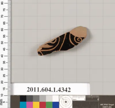 Terracotta fragment of a kylix (drinking cup)