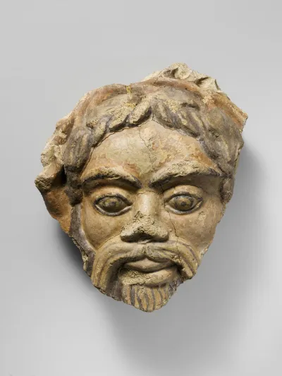Antefix, head of satyr