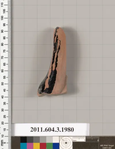 Terracotta fragment of a kylix (drinking cup)