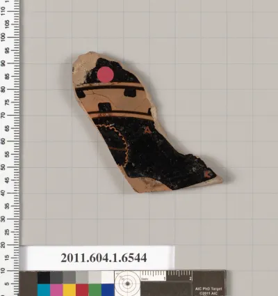 Terracotta fragment of a kylix (drinking cup)