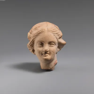 Terracotta head of a young woman