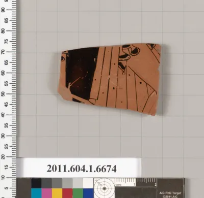 Terracotta fragment of a kylix (drinking cup)