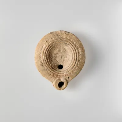 Terracotta oil lamp