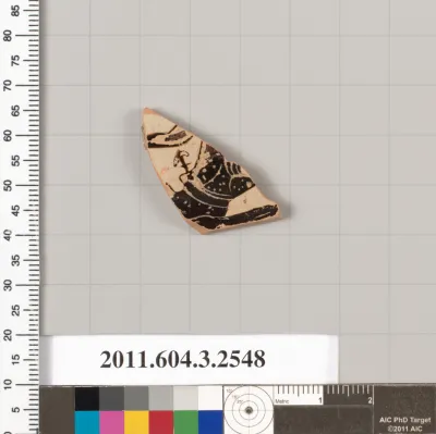 Terracotta fragment of a kylix (drinking cup)