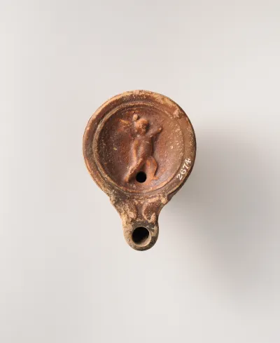 Terracotta oil lamp