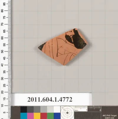 Terracotta fragment of a kylix (drinking cup)