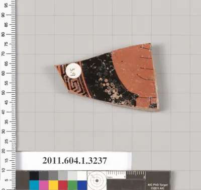 Terracotta fragment of a kylix (drinking cup)