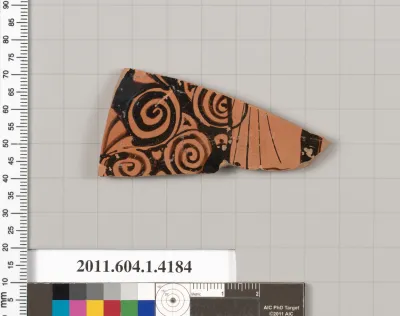 Terracotta fragment of a kylix (drinking cup)