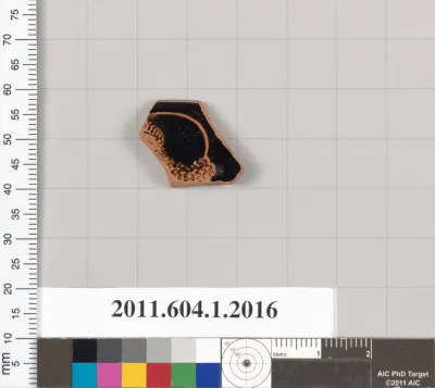 Terracotta rim fragment of a kylix (drinking cup)