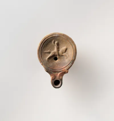 Terracotta oil lamp