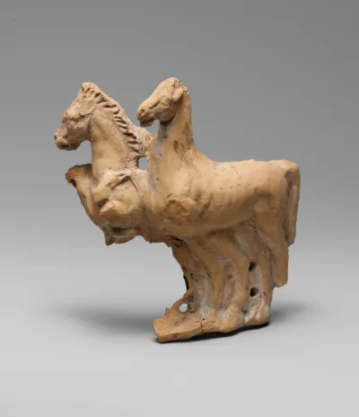 Fragmentary terracotta relief with two horses from a vase