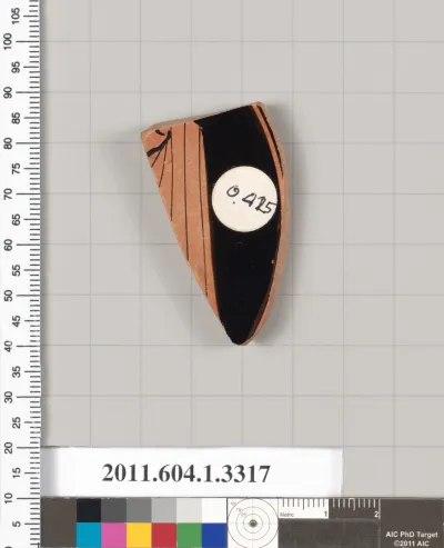 Terracotta fragment of a kylix (drinking cup)