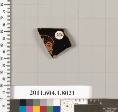 Terracotta rim fragment of a kylix (drinking cup)