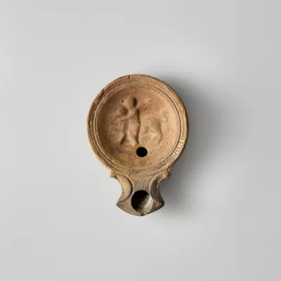 Terracotta oil lamp
