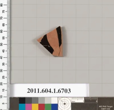 Terracotta fragment of a kylix (drinking cup)